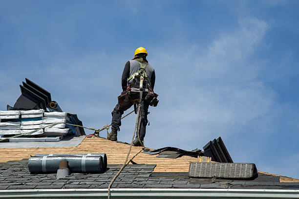 Professional Roof Replacement technician working in Taunton, MA